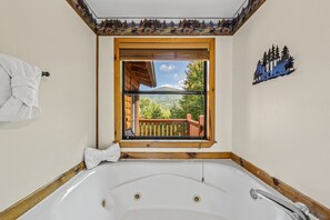 Relax in the jacuzzi tub after a fun day of adventure.