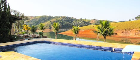 Hospede-se neste charmoso sítio com piscina e lazer em Santa Isabel/SP