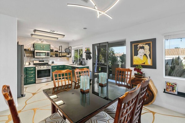 The Kitchen was another custom creation. The Mural of Mount Fugi as a backdrop draws your eye to the Kitchen from other areas of the Home. Open shelving allows you to find your plates and glasses with ease.