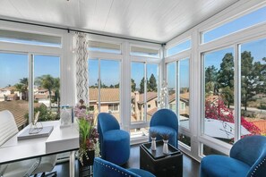 This second story Solarium flanking the Master Bedroom, allows the family to sit and enjoy the view in your robes. The Solarium boasts 180 degree views including the Ocean, Downtown skyline and Coronado Bridge.
