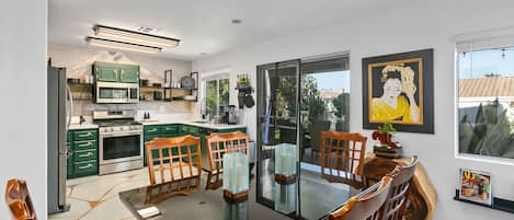 Open space shared Dining and Kitchen area