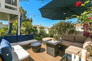 Enjoy the ambiance around the Fire in the day or dusk. Private corner that can seat your family while enjoying the flowering plants,succulents and fruit trees around the yard.