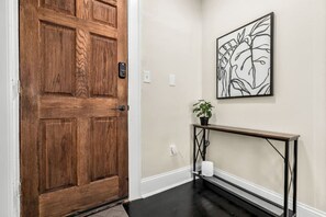 Entryway with smart lock and wifi extender for optimal high speed wifi.