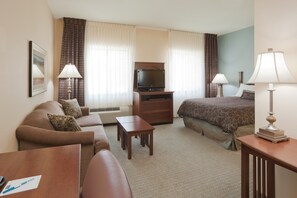 Sink into the cozy sofa after a day exploring the area.