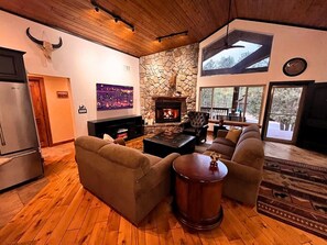 Kick back and relax in this spacious lodge-style living area.