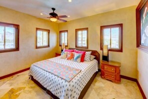 King sized bed with luxe linens