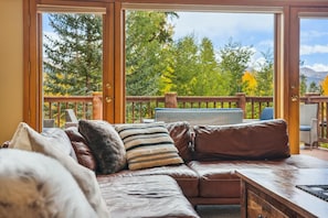 Enjoy Mountain Views on Cozy Leather Couch