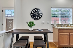 Dining nook with seating for four guests