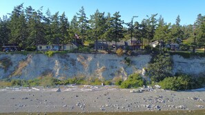 Backyard facing south on top of Penn Cove. Beach access 0.1mi to the west.