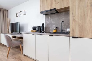 Modern, fully equipped kitchenette.