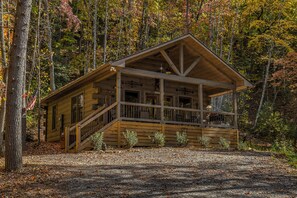 True log cabin with covered porch to enjoy the mountains