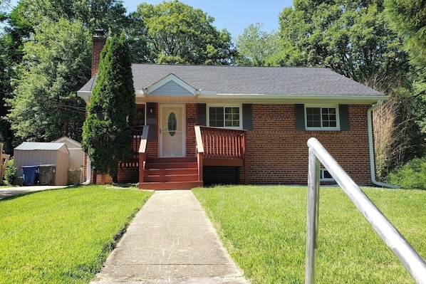 Front entrance of the home. Isn't it the perfect place to enjoy a morning cup of coffee?