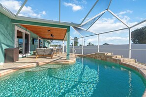 Heated pool with waterfall