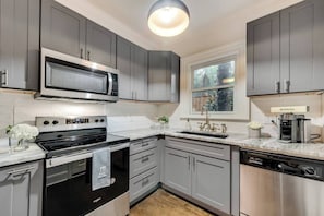 The kitchen is fully equipped with upgraded appliances, ensuring a seamless and enjoyable cooking experience during your stay. Complimentary Nespresso sleeve upon arrival.