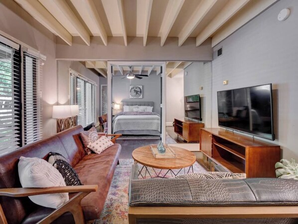 Living room with Smart TV. Open the french doors to your own front porch.