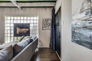 Living room entrance, cozy up next to the fireplace.