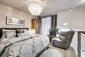 This versatile loft area can be used as a cozy secondary bedroom or a productive office space, offering flexibility to suit your needs with ample room to relax or work comfortably.