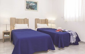 Relax on the comfy bed after a day outside.