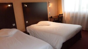 Get a peaceful night sleep in our cozy bedroom.