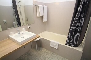 Freshen up in the bathroom after a day of adventure.