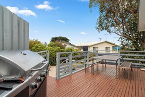 Enjoy al fresco dining on the deck with serene surroundings