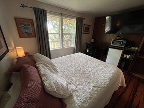 View of trees from bed.