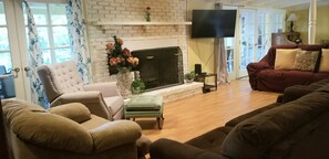 living room 2 sets french doors lead to patio