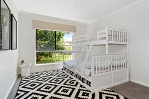 Comfortable Bedroom with Tribunk and trundle bed