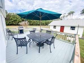 Deck view of garage and driveway.