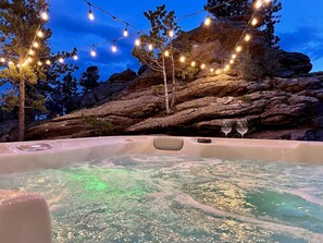 Relax in your brand new hot tub below twinkling lights.