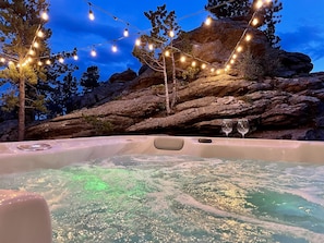 Relax in your brand new hot tub below twinkling lights.