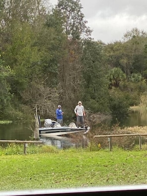 We look forward to seeing your boat and fishing poles.  This is steps from your front door and yes, there is a private boat ramp and dock for your use!