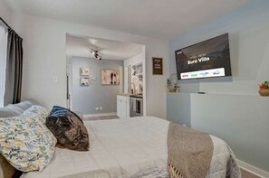 Experience Ultimate Comfort on Our Cozy Sofa Bed with Soft Pillows and Blankets - Perfect for Movie Nights Together!