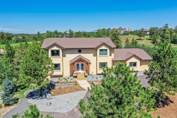 Our Home Is Enveloped in Lush Greenery, Towering Trees, and Mesmerizing Mountain Views. Breathe in the Crisp Colorado Air for a Vacation Experience Like No Other.