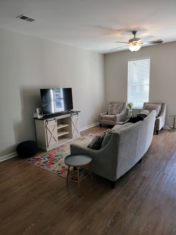 Living Room with 50 inch SMART TV.