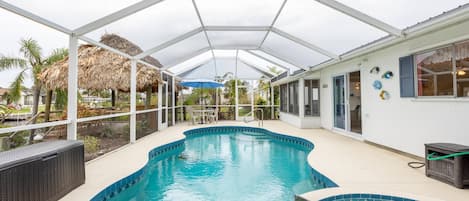 Relax in the spa or play in the pool while you enjoy this fantastic backyard