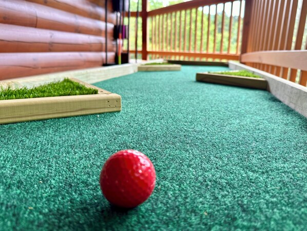 Enjoy your very own custom mini-golf hole on the deck!