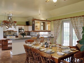 Large dining kitchen with patio doors  | Gordons Hall Cottage, Carnbee, near Anstruther
