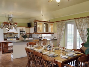 Large dining kitchen with patio doors | Gordons Hall Cottage, Carnbee, near Anstruther