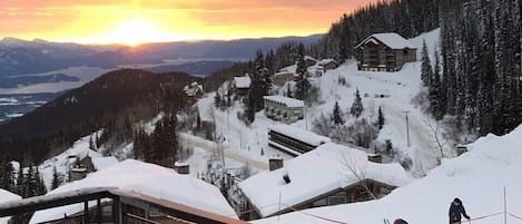 Views from hot tub of adjacent ski trail to The Village, and Lake Pend Oreille.