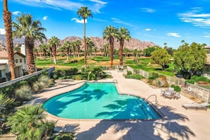 Large, fenced community pool directly adjacent to Casa Lily