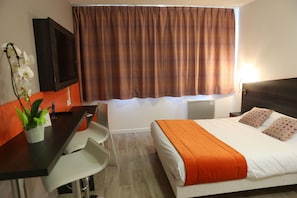 Get a peaceful night sleep in our cozy bedroom.