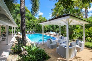 Covered gazebo with comfy lounge chairs - every spot is designed with max comfort