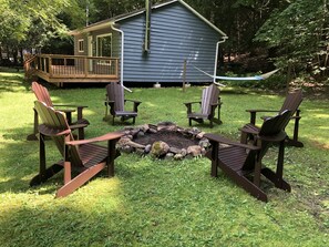 Chill around the campfire in classic Adirondack chairs. A northern favourite. 