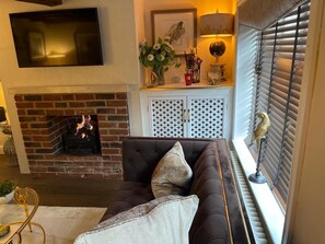 LOUNGE WITH OPEN GAS FIRE, TV WITH SKY, DOUBLE SOFAS, REDMOTE CONTROLLED LIGHTNG