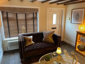 LOUNGE WITH OPEN GAS FIRE, TV WITH SKY, DOUBLE SOFAS, REDMOTE CONTROLLED LIGHTNG