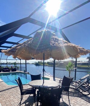 Solar lit tiki umbrella. Perfect spot for afternoon shade or sunset dinner. 