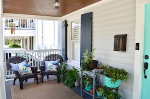 The front porch is ideal for evenings and the occasional rainy day