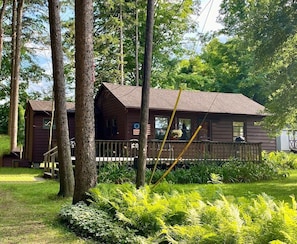 Home from front - backs up to state park. Walk out your  back porch to the trails.  The deck on the front has a gas grill and seating for 4-5 guests. 