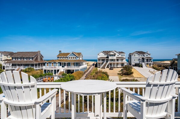 Seaside serenity beckons! Relax, basking in the coastal charm with a panoramic ocean view.